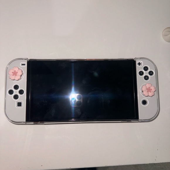 New Nintendo Switch OLED with case , screen protector and joystick thumb grips - Picture 1 of 3